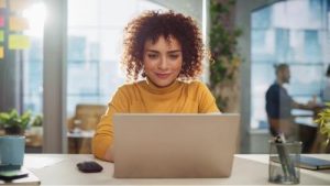 Girl researching on a laptop