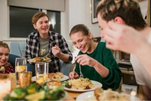 People eating food together 