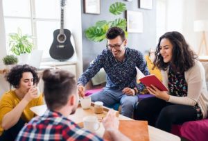 A group of students happy in a house